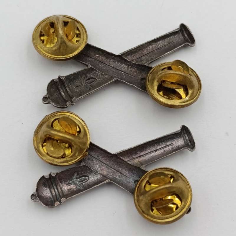 Pair of SWATF Artillery collar badges