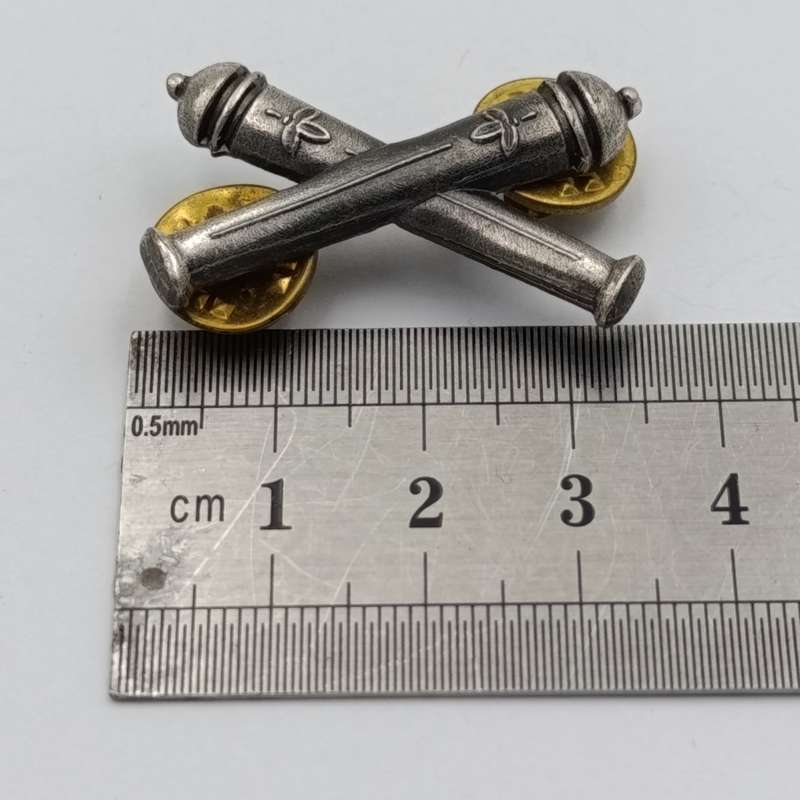 Pair of SWATF Artillery collar badges