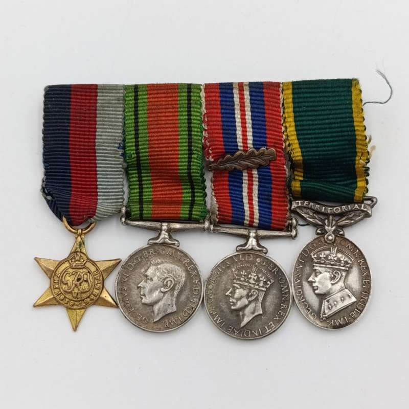 Set of 4 WW2 miniature medals with mentioned in despatched oak leaf
