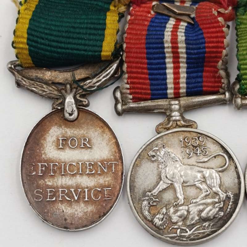 Set of 4 WW2 miniature medals with mentioned in despatched oak leaf