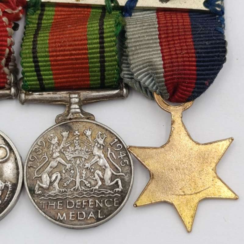 Set of 4 WW2 miniature medals with mentioned in despatched oak leaf