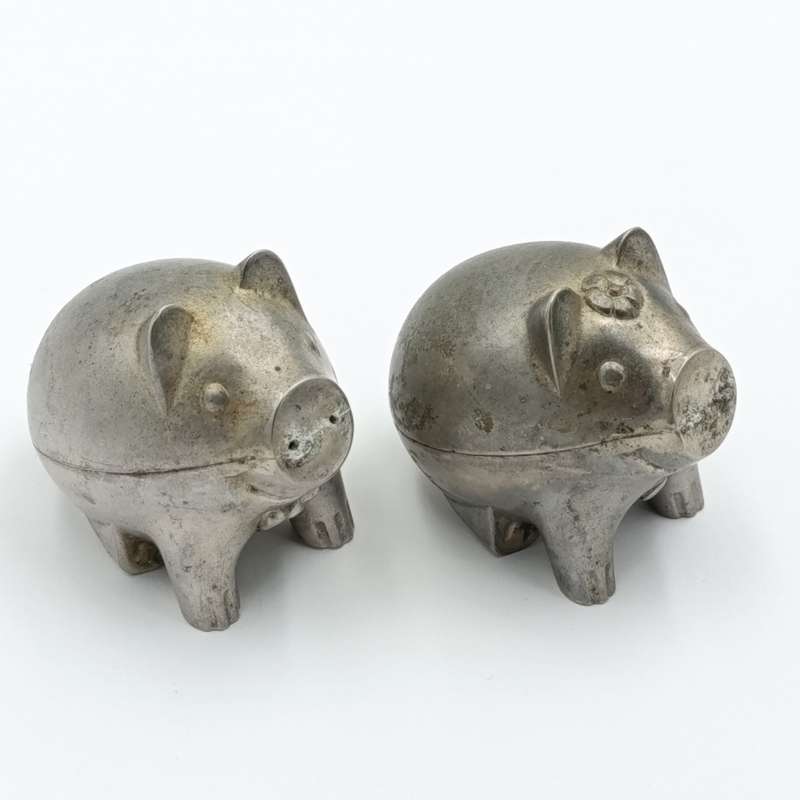 Pair of metal Piggy salt and pepper shakers