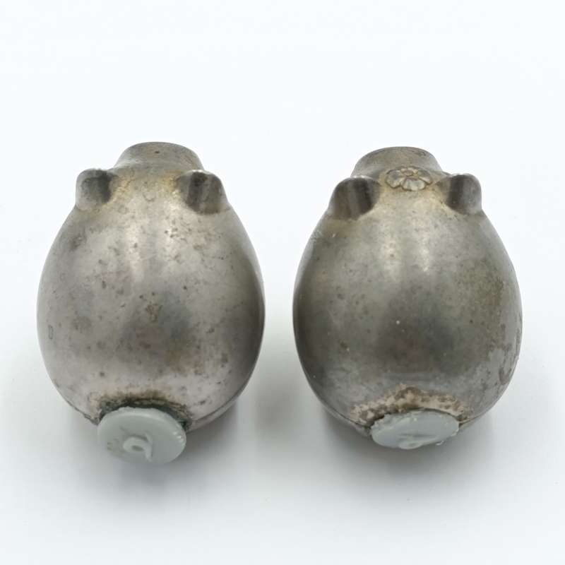 Pair of metal Piggy salt and pepper shakers