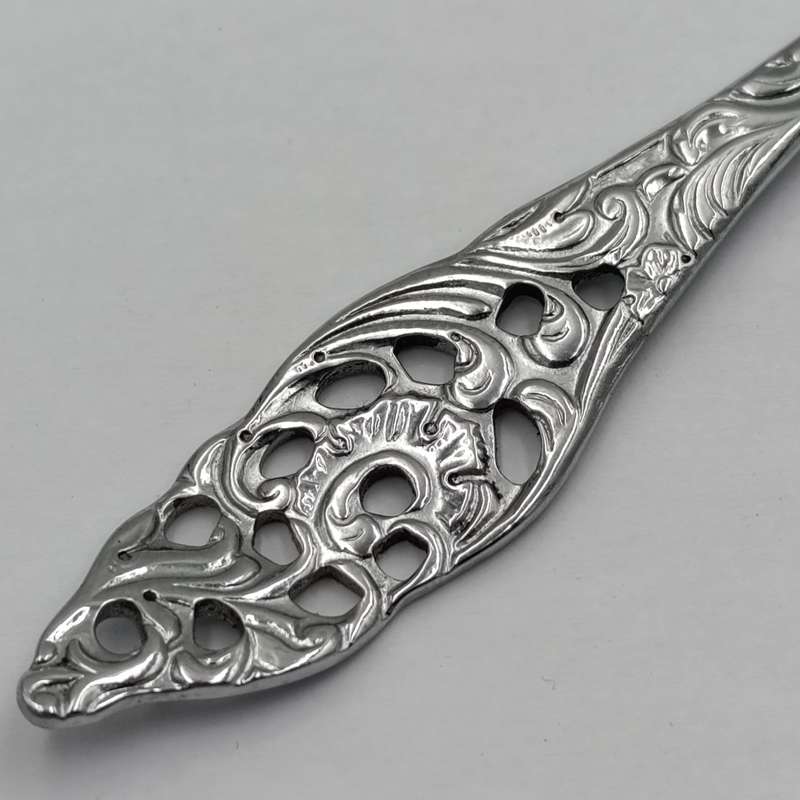 Vintage chrome plated sugar spoon