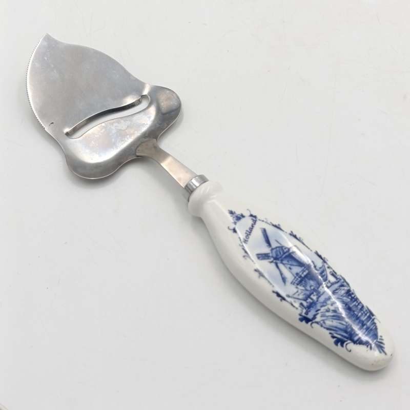 Vintage Cheese cutter with porcelain Holland handle