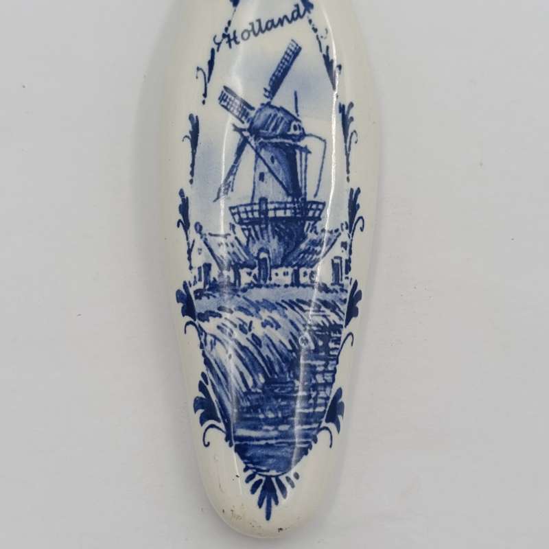 Vintage Cheese cutter with porcelain Holland handle