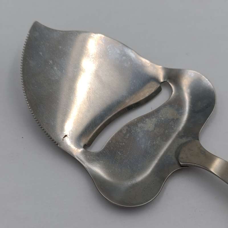 Vintage Cheese cutter with porcelain Holland handle