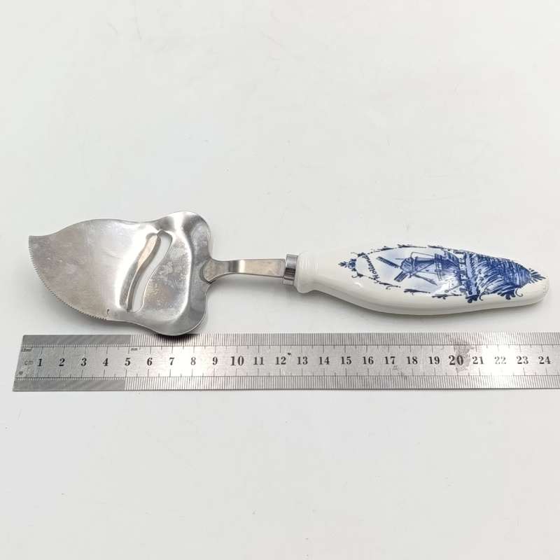 Vintage Cheese cutter with porcelain Holland handle