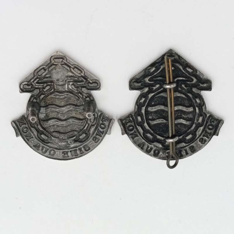 Lot of 2 different SA Ordnance services Corps cap badges