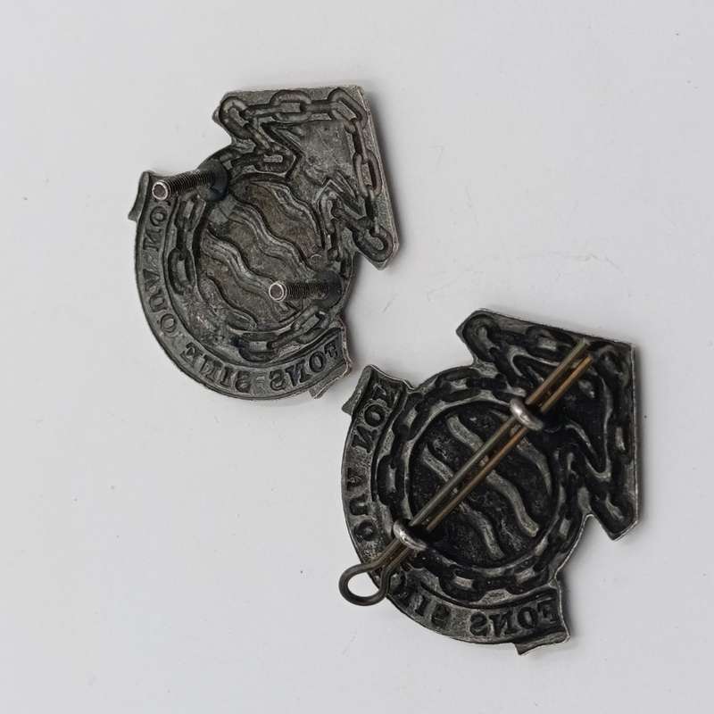 Lot of 2 different SA Ordnance services Corps cap badges