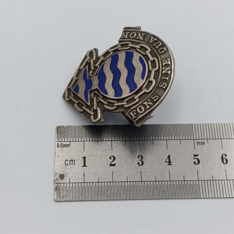 Lot of 2 different SA Ordnance services Corps cap badges