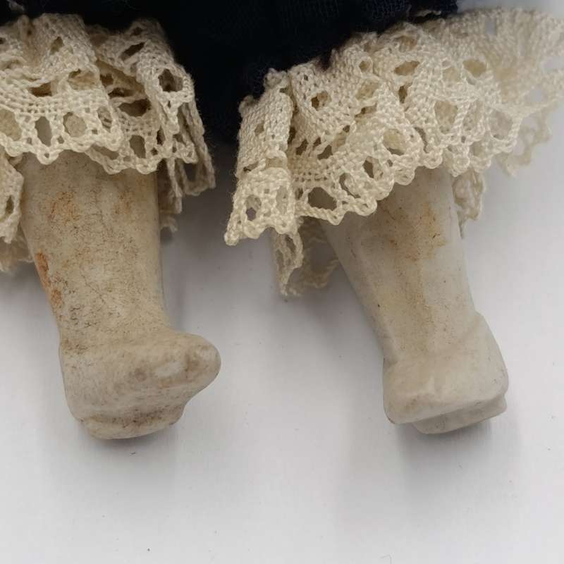 Antique rosy cheeks doll - late 1800's - 22cm long