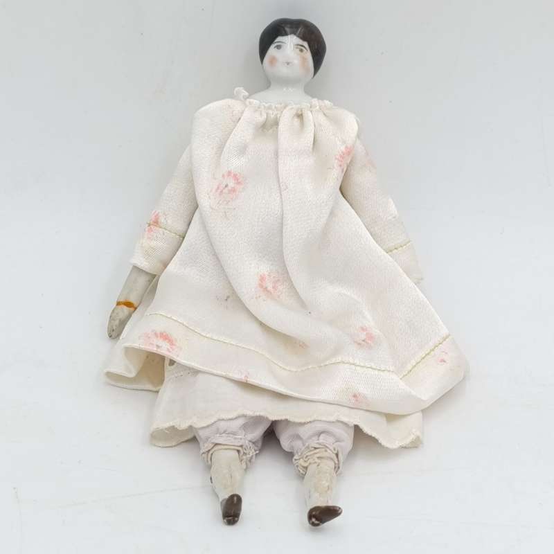 Dark hair rosy cheeks blue eyes antique doll - 19cm long - repaired hands