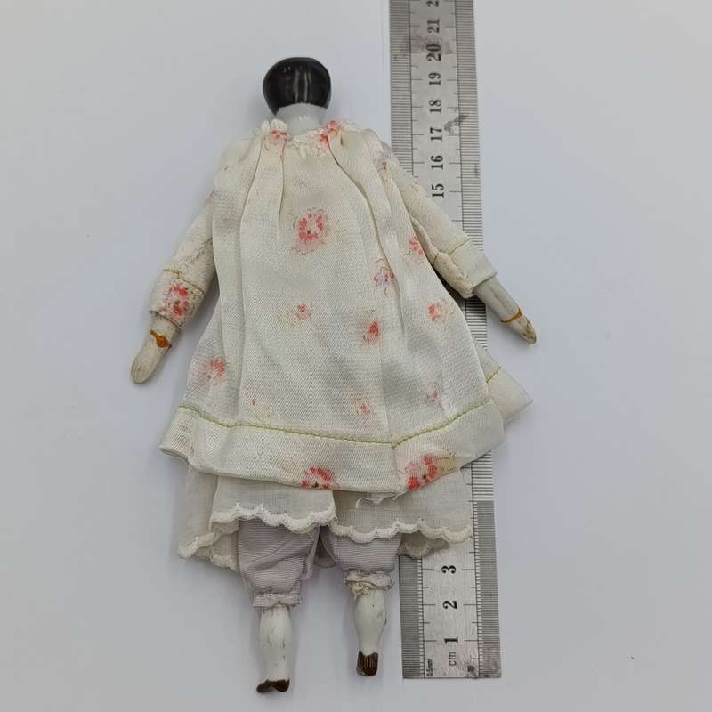 Dark hair rosy cheeks blue eyes antique doll - 19cm long - repaired hands