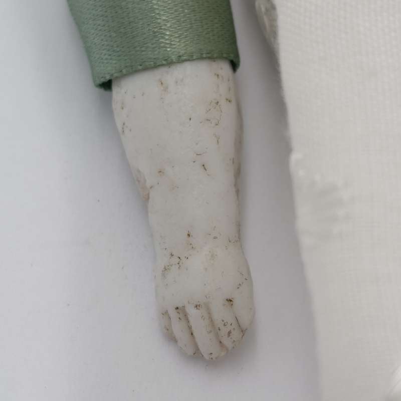 Antique Bisque doll 20cm long - hat chipped - late 1800's