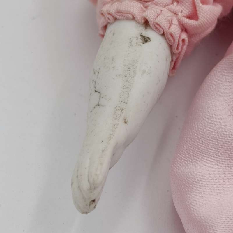 Bisque China head doll - 22cm high - chip on head - antique