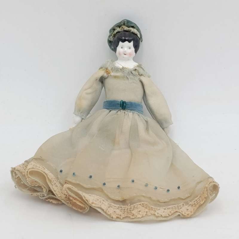 Antique Brown hair rosy cheeks German doll with hat - late 1800's - 18cm long