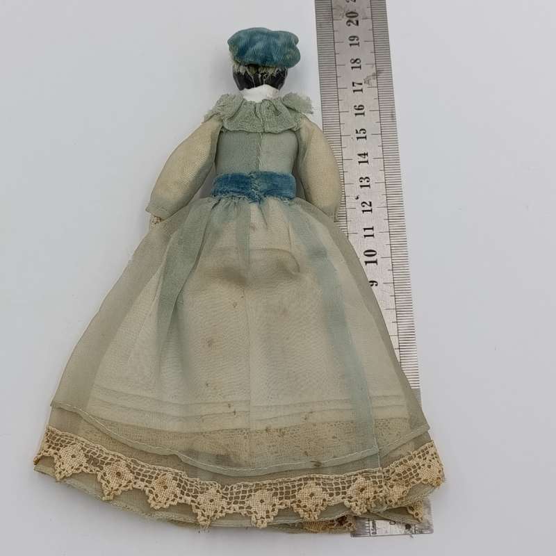 Antique Brown hair rosy cheeks German doll with hat - late 1800's - 18cm long