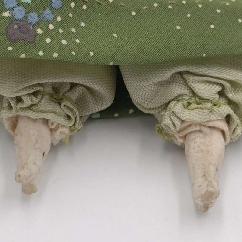 Dark hair rosy cheeks antique doll - 15cm long