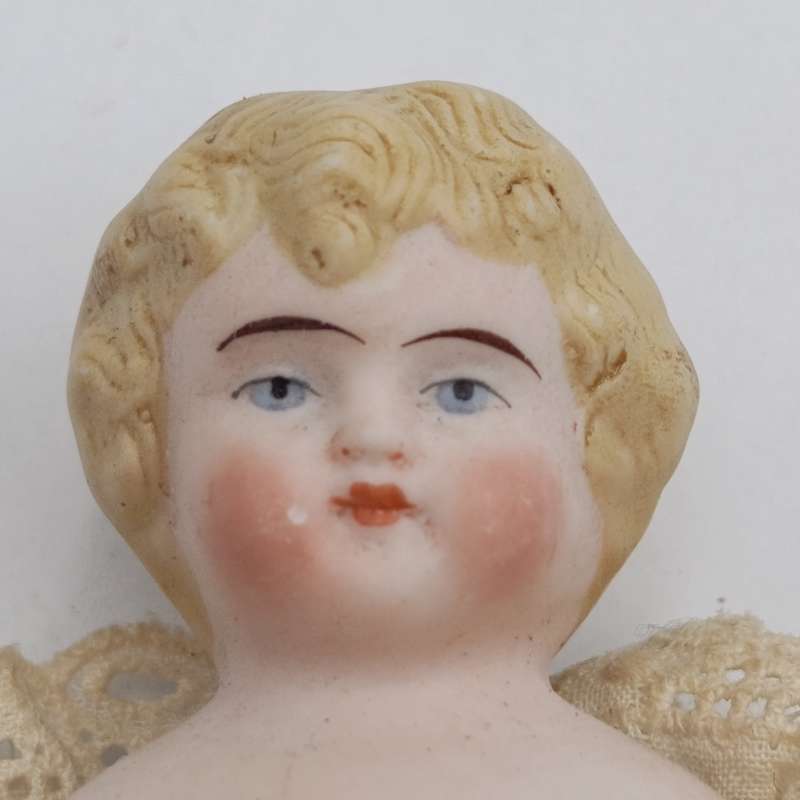 Golden blond rosy cheeks german Bisque doll - 19cm long - Antique late 1800's