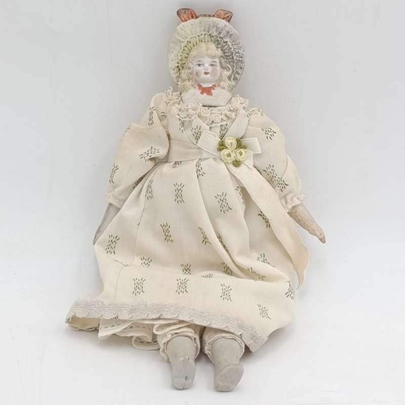 Antique Bisque doll - 21cm long - blonde hair