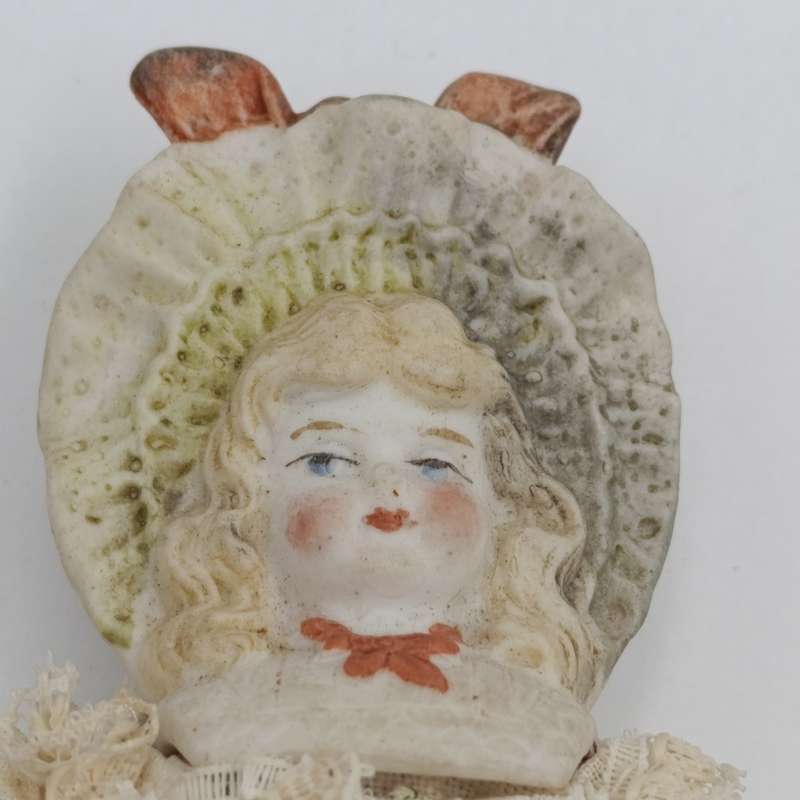Antique Bisque doll - 21cm long - blonde hair