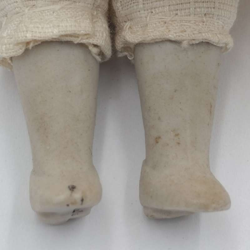 Antique Bisque doll - 21cm long - blonde hair