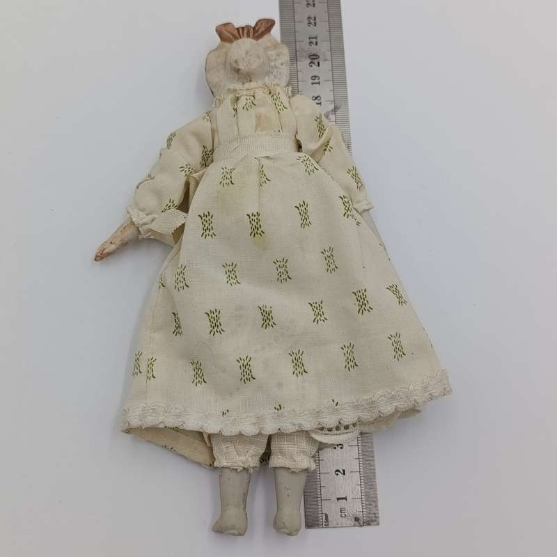 Antique Bisque doll - 21cm long - blonde hair