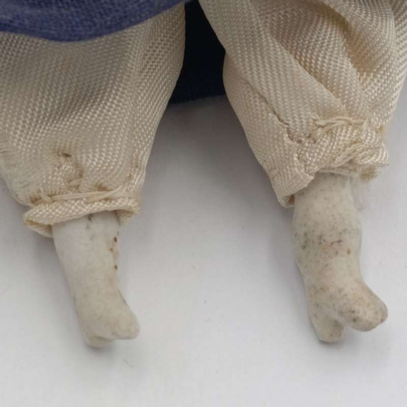 Dark hair rosy cheeks antique doll - 17cm long