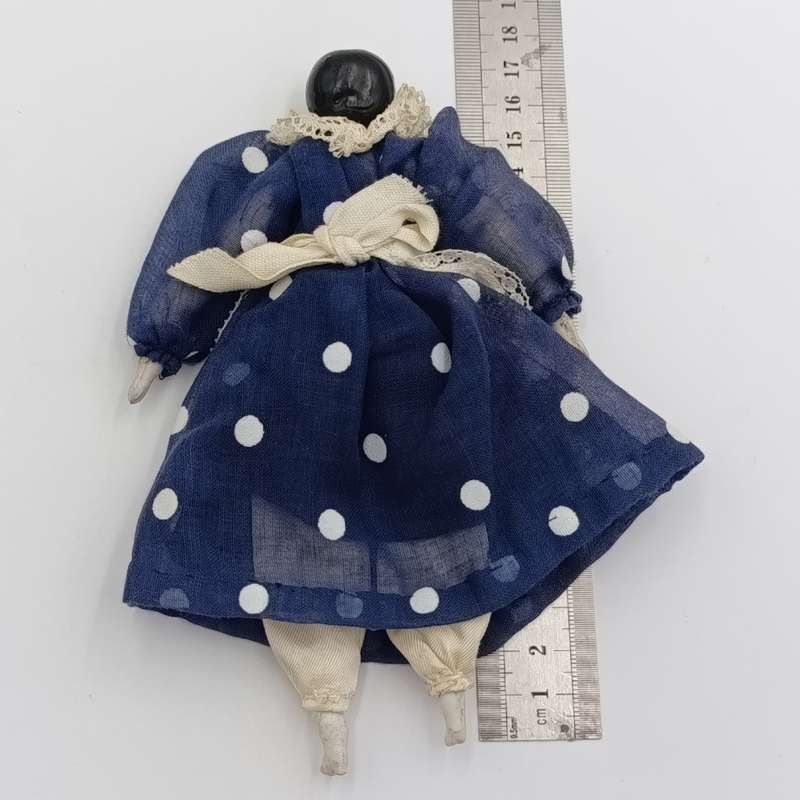Dark hair rosy cheeks antique doll - 17cm long