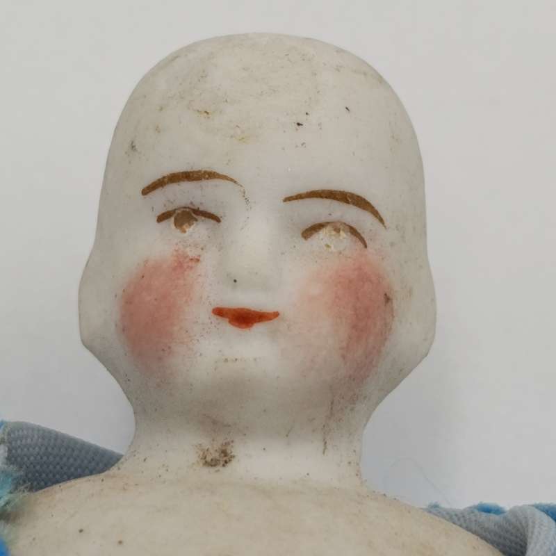Antique rosy cheeks doll - bisque - late 1800's - small chip