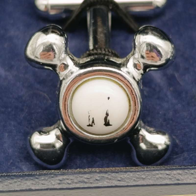 Pair of bathroom tap shaped cufflinks