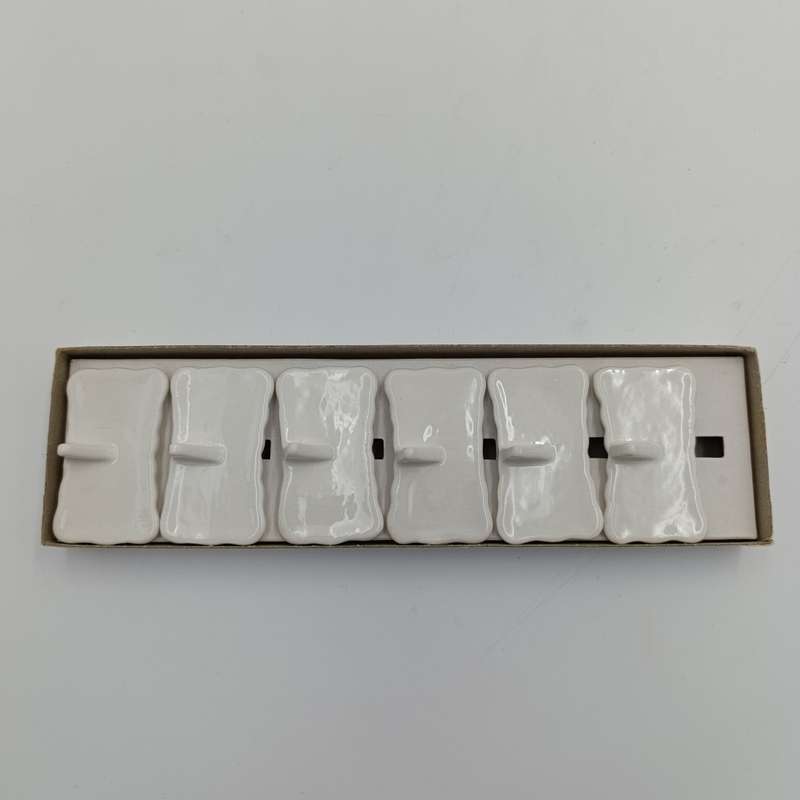 Set of 6 porcelain name plate stands in box