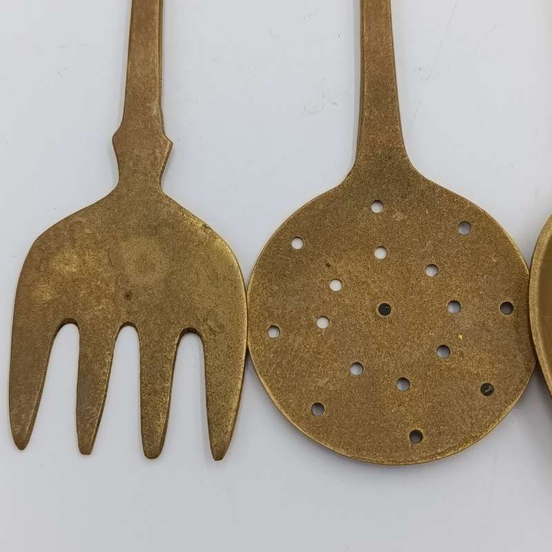 Set of vintage brass wall hanging utensils