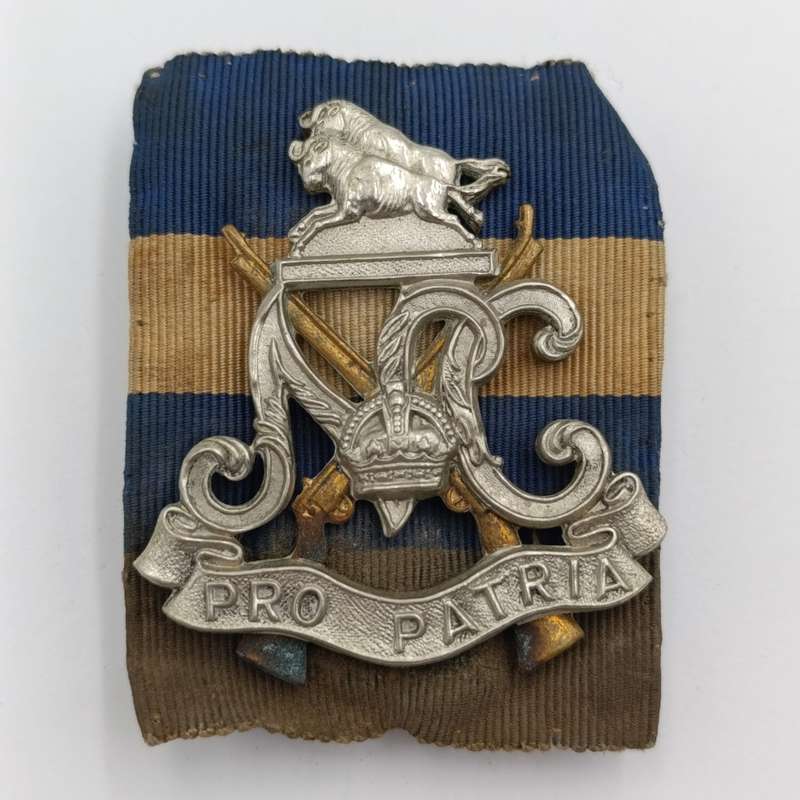 WW2 South Africa Natal Carbineers cap badge with cloth backing
