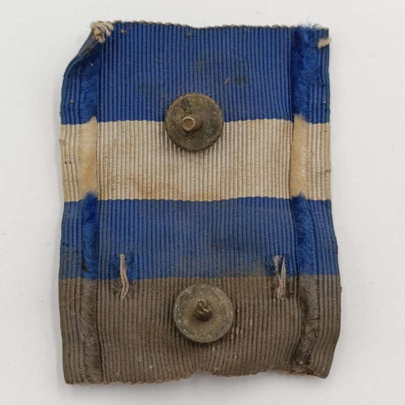WW2 South Africa Natal Carbineers cap badge with cloth backing