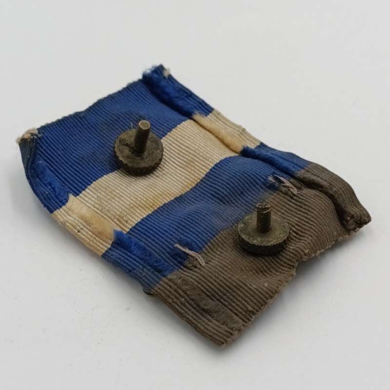 WW2 South Africa Natal Carbineers cap badge with cloth backing