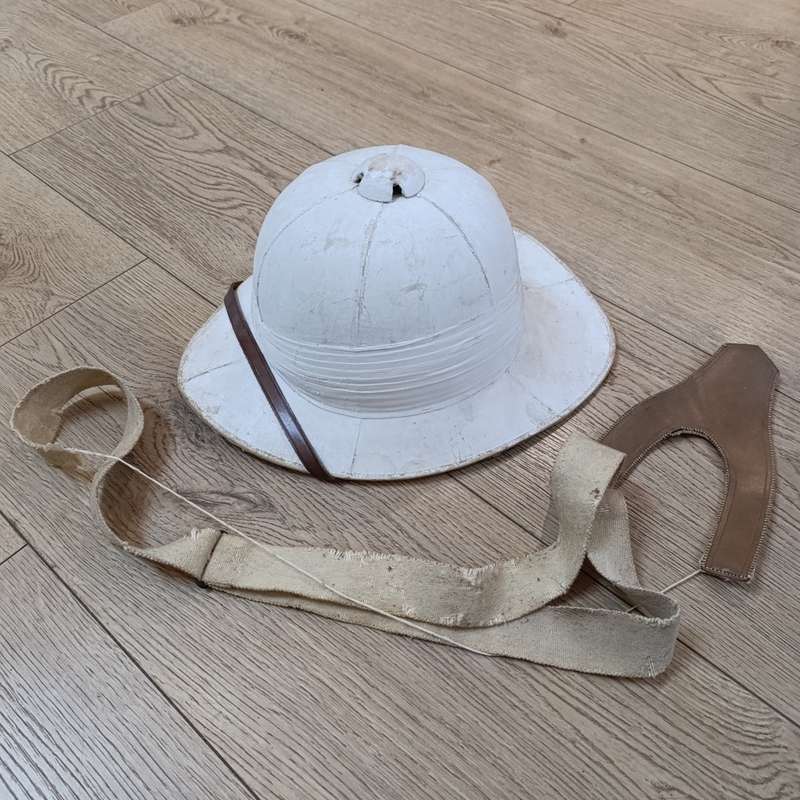 Boer War British Wolseley Pith helmet in steel tin marked W.S Howard