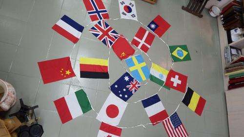 Lot of 20 flags made up into bunting string about 9 m long - as per photo