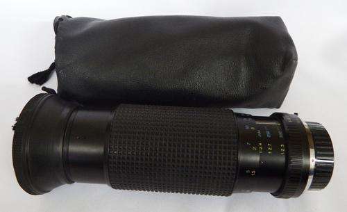 Tokina 100 - 300 zoom lens - Minolta mount - with bag - as per photo