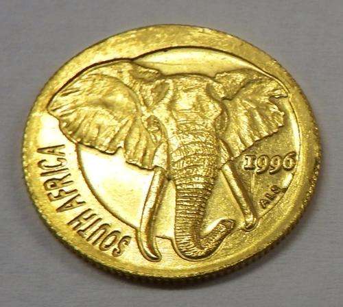 Natura Elephant Series 1/10 Oz Gold Coin - 1996 Elephant carrying an uprooted tree - as per photo