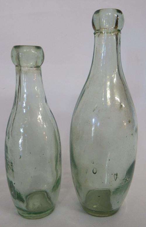 Pair of antique glass bottles - as per photo