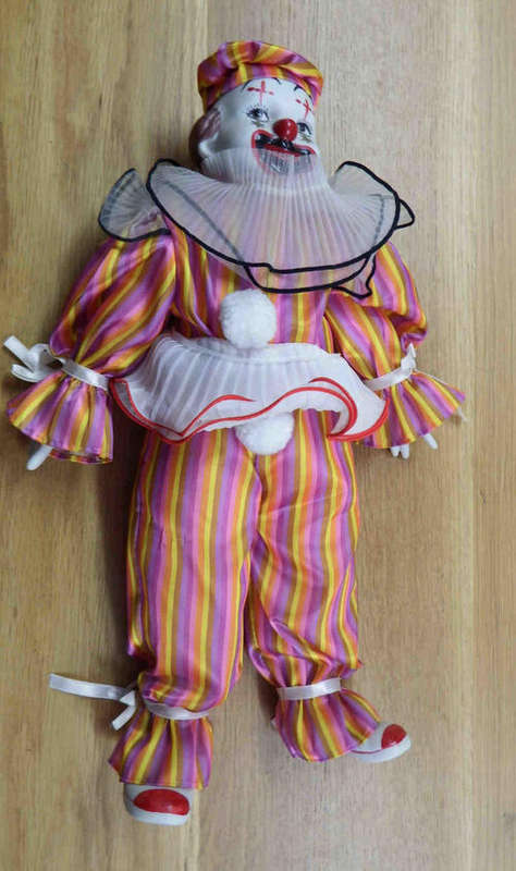 Porcelain Clown as per photo - 24cm long