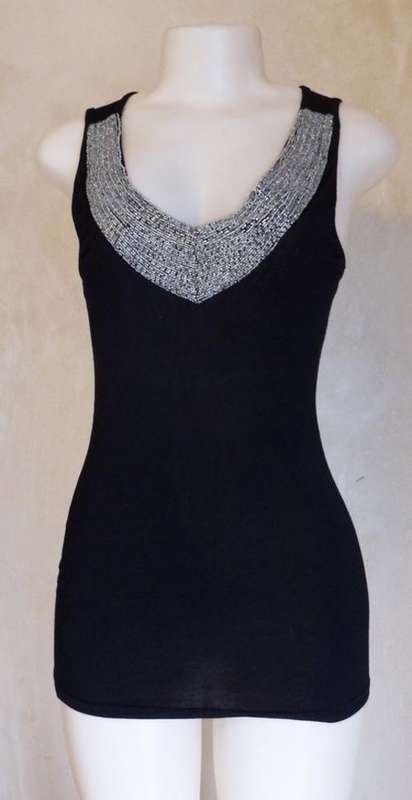 Striking size 8 cotton / polyester black top - as per photo
