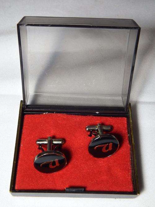 Pair of Enamelled United Bank cufflinks