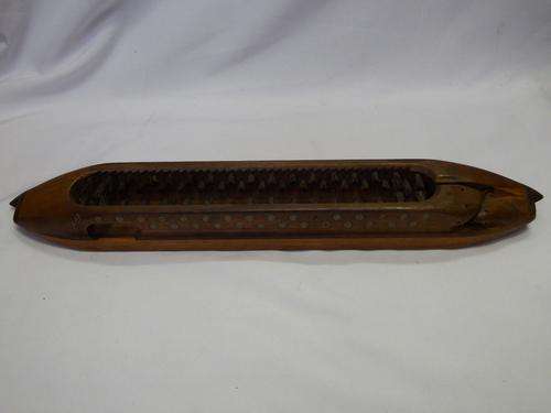 Antique weaving loom shuttle