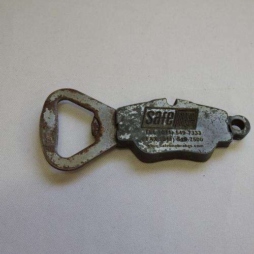 Safeline advertising bottle opener with break pad