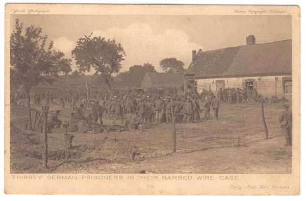 Post Card - Thirsty German prisoners in their barbed wire cage - official war photographs-unused