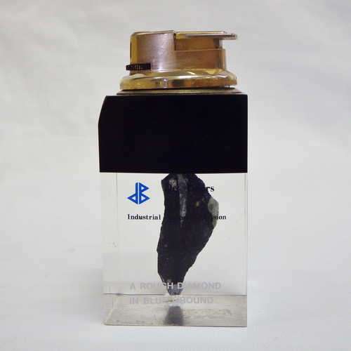 De Beers Industrial Diamond Division - A rough diamond in blue ground - table lighter - working