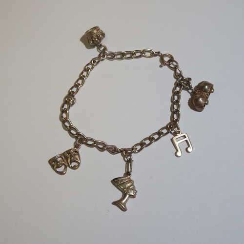 Silver charm bracelet - weighs 12.8 g